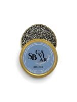 Open Beluga caviar tin showing large dark grey pearls