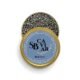 Open Beluga caviar tin showing large dark grey pearls
