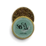 Open Osietra caviar tin showing dark caviar pearls
