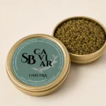 Open Osietra caviar tin showing dark caviar pearls
